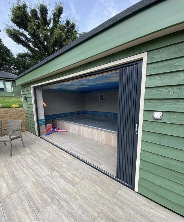 anthracite bifold doors pool room