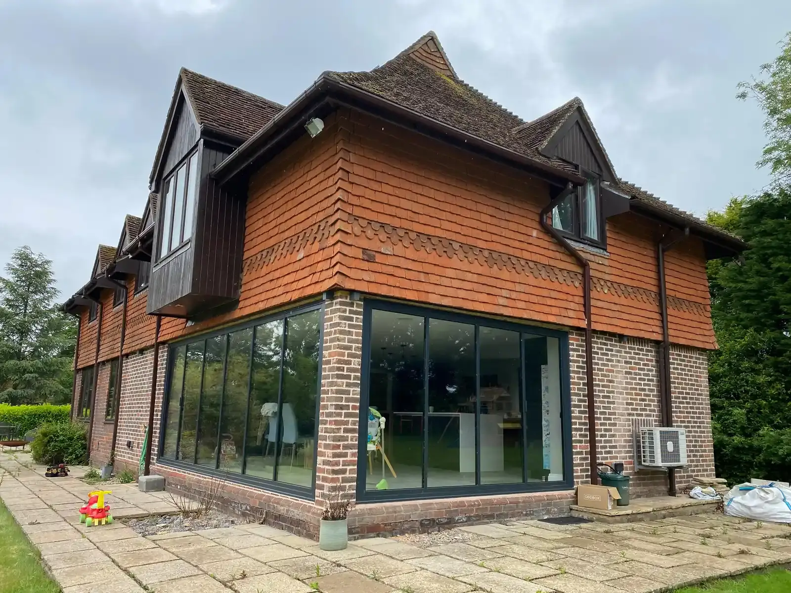 corner external folding doors in a brick house