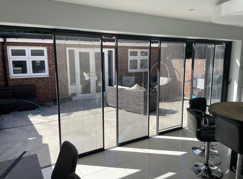 spaced slide and stack doors with integral blinds