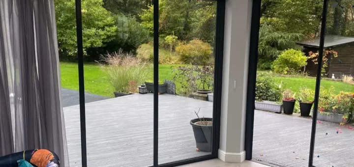 living room black sliding doors with curtains