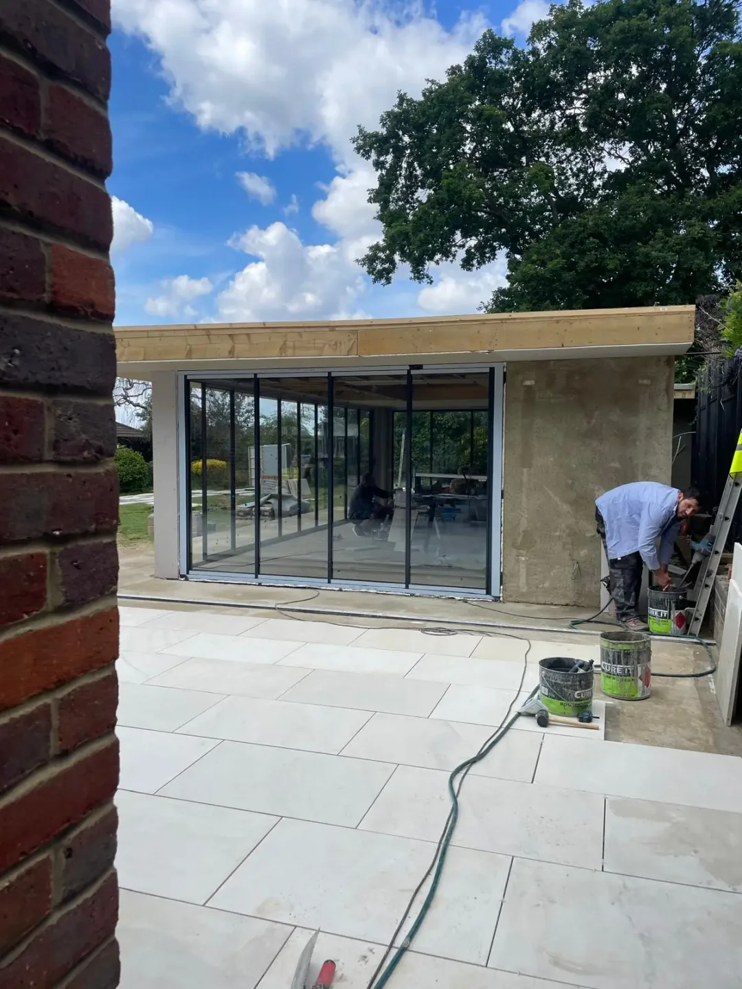 new build with garden room sliding doors